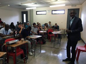 Christian Locka presenting at the African Investigative Journalism Conference held at the University of the Witwatersrand in Johannesburg.